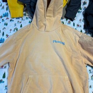 Pleasing Peach Hoodie with Blue Logo
